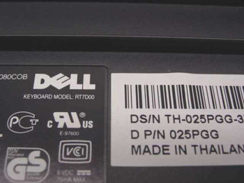 Dell RT7D00 keyboard underside label showing model RT7D00, Dell P/N 025PGG, made in Thailand