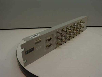 Nortel NTFP99AB DS3/E3 3-Channel Sparing Panel – front angled view showing BNC connectors and two DB9 ports, panel label reads FP-1