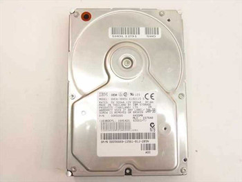 IBM DHEA-38451 8.45GB 3.5-inch IDE hard drive — top view showing platters and IBM OEM label with barcode