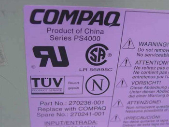 Compaq PS4000 label showing Part No. 270236-001, Spare No. 270241-001, UL CSA TÜV certifications