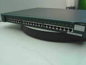 Cisco WS-C2924XL 24-port 10/100 managed switch — front panel showing 24 RJ-45 ports and LED status indicators, with label showing IP address on chassis