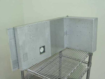Photo-Sonics camera tracking table – front panel view showing Starrett dial meter mounted in aluminum enclosure on wire shelf