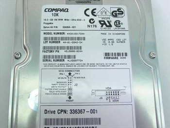 Compaq 336367-001 drive label close-up showing model number, option kit, serial number, firmware, and SCSI connector diagram