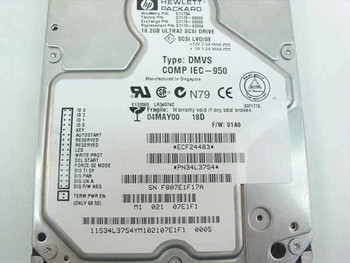 HP D7175-63000 hard drive label close-up showing part numbers, DMVS type, LVD/SE interface, firmware S1A0, and manufacture date