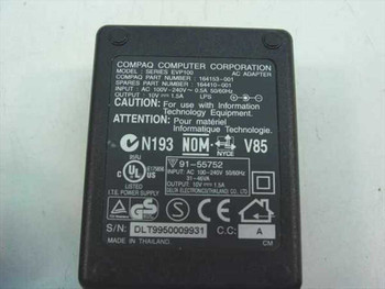 Compaq 164410-001 EVP100 AC Adapter rating plate showing model, part number, input 100-240V 0.5A and output 10V 1.5A specs