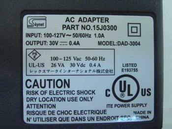Skynet DAD-3004 rating label – shows Part No. 15J0300, Input 100-127V 1.0A, Output 30V DC 0.4A, UL Listed