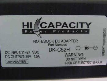 Hi Capacity DK-C52H label closeup showing Part Number, DC Input 11-27V, DC Output 20V 4.5A, 90W Adapter rating