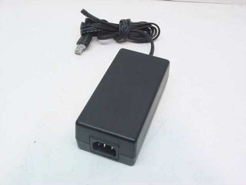 HP 0950-4466 AC power adapter — three-quarter view showing IEC C14 input and output cable