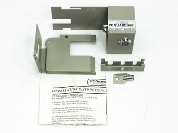 PC Guardian Model 203 complete kit laid out: lock housing, base plate, mounting brackets, key, and installation instructions