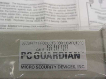 PC Guardian / Micro Security Devices label on packaging — shows brand name, phone numbers, and address