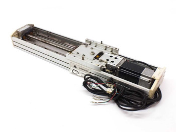 Taiyo XY-5015 linear actuator full unit angled view showing ball screw, carriage, Yaskawa servo motor, and motor cables — top cover absent