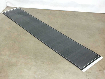 Solopower SP1 60W flexible thin-film CIGS solar panel laid flat on the floor showing full 86.5-inch length