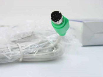 Logitech SYM1320 Wheel Mouse Pro – close-up of green PS/2 Mini-DIN 6-pin connector and wired cable