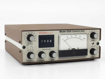 Monolight Model 6200 Control Unit – front panel three-quarter view showing Sync Select, Flash Trigger, X Shift knobs, 4-digit wavelength display reading 1598, and analog meter