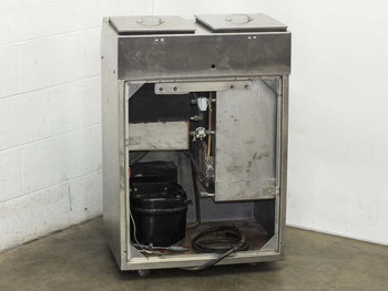 Tronic MK IV bath tank rear view with access panel removed exposing compressor and internal components