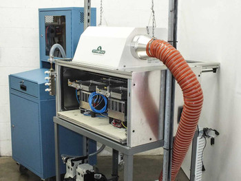 Hydrofarm PS-24-20 Solar Soak System — closer view of open rack showing two TE Technology thermoelectric module assemblies, blue pneumatic tubing, and orange flexible exhaust duct connected to Hydrofarm luminaire housing