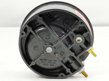Dwyer 2008 Magnehelic gauge rear/back view showing plastic housing, mounting tabs, and two brass barbed pressure ports