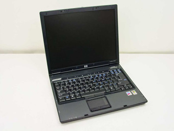 HP Compaq nc6230 laptop – three-quarter front view showing lid open, keyboard, and display