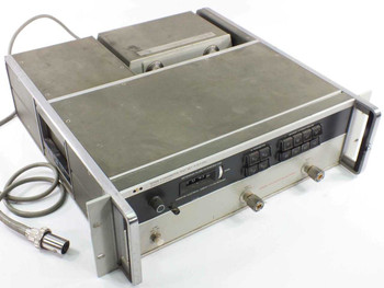 HP 8746B S-Parameter Test Set front-left three-quarter view with 8411A Harmonic Frequency Converter module on top and interconnect cable