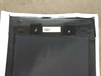Xunlight XUS10-71 flexible solar panel rear view showing two metal tab junction box connectors and barcode label