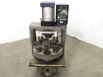Polaris Accu-Weld 7100 weld head – rear-right view showing rotary indexing table with 10 weld tooling fixtures and open electronics enclosure at upper right
