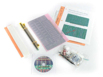 Ithaca Intersystems 16/64 EPROM Board Kit contents laid out — PCB in anti-static sleeve, component bag, CD-ROM disc, reference sheets, and conversion chart