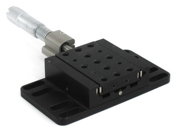 Newport 460P-X linear stage with SM-25 micrometer – angled rear-left view showing base plate mounting slots, top plate tapped hole grid, and micrometer clamp block