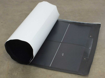 Xunlight XRD12-100 flexible amorphous solar panel partially rolled up, showing dark cell surface and white ETFE backing