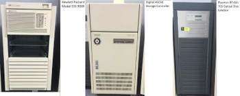 Hewlett-Packard Model E35 9000 workstation tower, Digital HSC50 Storage Controller floor-standing cabinet, and Plasmon RF-60J-703 Optical Disk Jukebox tall tower unit — front panel views