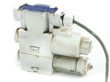 Yuken DSG-01-2B2-D24-60 directional valve assembly — right-side view showing Yuken label on solenoid top cap and wiring harness