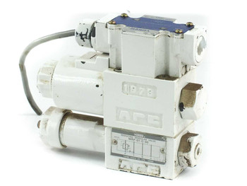 Yuken DSG-01-2B2-D24-60 hydraulic directional valve with MRP-01-C-30 reducing modular valve — front-left three-quarter view showing IP73 enclosure rating and solenoid body