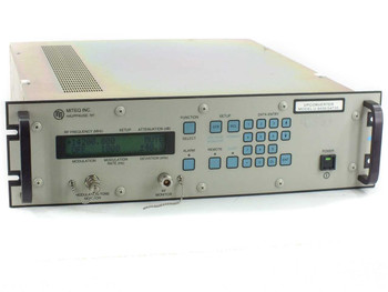 Miteq U-9456 54735 Ku-Band Upconverter front panel with LCD display showing 14200.000 MHz RF frequency, modulation controls, numeric keypad, and power switch