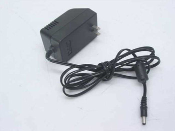 Salom Electric SPA-1210 AC adapter front view showing compact black body with folding US plug prongs and attached barrel plug output cable