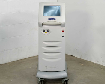 Lumenis Novus Varia Multicolor Photocoagulation Laser System – front view showing touchscreen display, laser warning indicator, and red emergency stop button on white floor console with casters