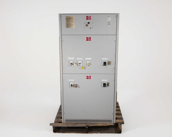 Best Power Technology transfer switch cabinet front view showing circuit breaker panel sections and warning labels