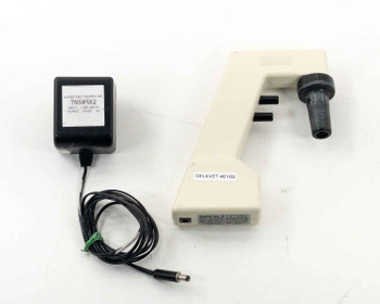 Drummond 4-000-100 Pipet-Aid Pipette Controller shown with Barnstead Thermolyne TN509X2 AC adapter and coiled power cable on white background