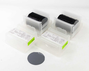 Atecom 100mm P-type epitaxial silicon wafers – overview of four cassette boxes and one loose wafer on white background