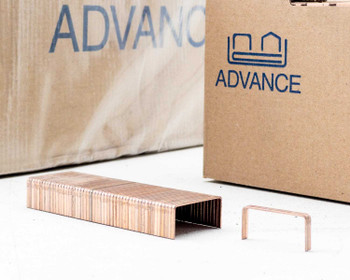 Open Advance staple box showing multiple staple sticks arranged in rows inside the box