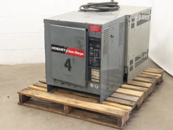 Hobart 600B1-18 charger detail view, showing automatic control mechanism and time-of-day scheduling interface