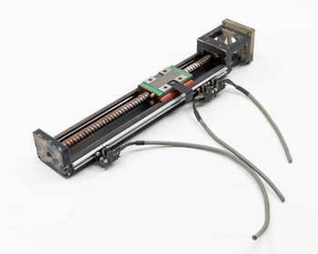 Hiwin KK60 linear ball screw stage full assembly angled view showing rail, carriage, and attached cables