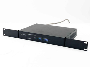 Pakedge S26e 24-Port Gigabit Switch with rack ears attached – angled front-left view showing top and front panel with LED indicators