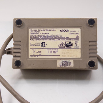 Compaq Series 2692 AC Adapter bottom label showing AA16020 model number, Series 2692, input 100-240V 50/60Hz 0.8A, output 5V 2A and 6.8V 0.625A, made in Malaysia, certifications UL CSA GS