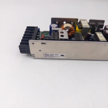 Omron S8VM-15024 power supply – side label view showing model number, voltage and current ratings, and UL listing mark