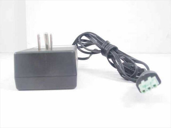 HP 0950-4392 AC Power Adapter — side profile view showing compact brick body, AC prongs, and 3-pin output cable
