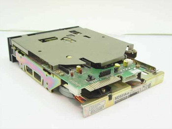 Fujitsu M2551A floppy drive with top cover removed — internal mechanism, PCB, and M2551A08 model label visible on chassis