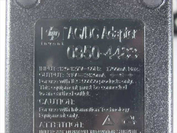 HP AC/DC Adapter 0950-4483 bottom label showing 31V 2420mA output specs and part number