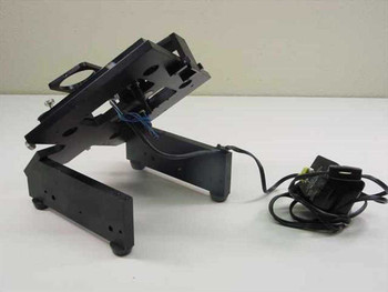 Custom optical stage assembly shown folded/tilted — side profile view with external AC adapter visible