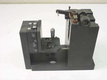Daedal linear slide custom inspection assembly – front-left three-quarter view showing anodized black base, micrometer adjuster, and multi-axis mounting hardware