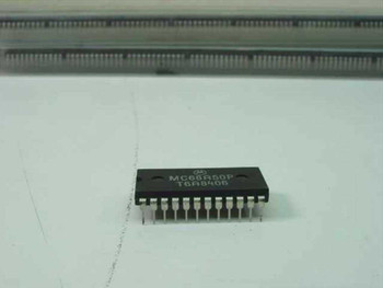 Motorola MC68A50P ACIA 24-pin DIP IC chip top view showing model marking MC68A50P and date code T6A8406