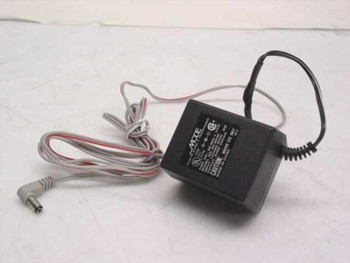 Mode Electronics DV-6500 AC adapter full view showing black transformer body and attached gray output cable with barrel plug